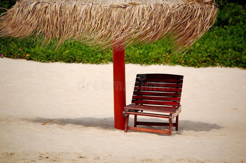 Umbrella and seat on the beach