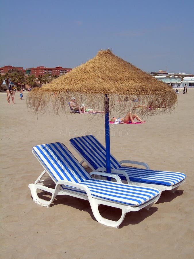 Umbrella and two chairs