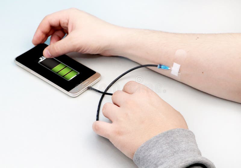 Un adicto a la tecnología El concepto de dependencia del smartphone, teléfono fotografía de archivo Un adicto a la tecnología El concepto de dependencia del smartphone, teléfono fotografía de archivo