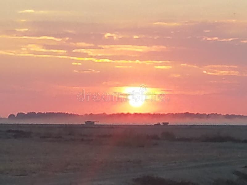 Un altro tramonto di delta fotografia stock Un altro tramonto di delta fotografia stock