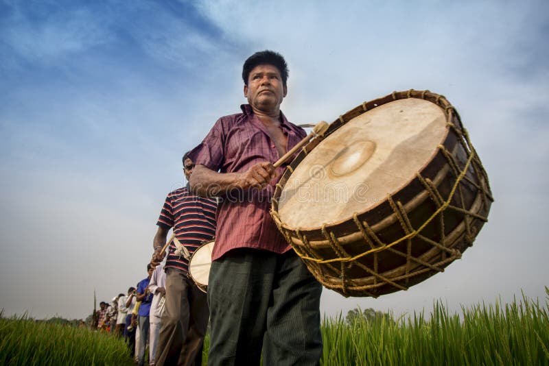 This photo of a drummer playing drum was captured in Gajan Festival, in Kota, Arambagh. This photo of a drummer playing drum was captured in Gajan Festival, in Kota, Arambagh.