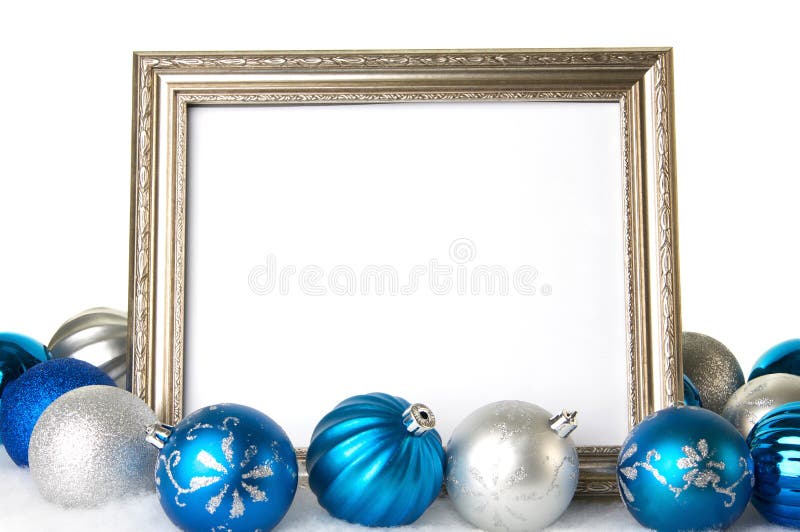Un cadru gol de argint cu ornamente de Crăciun albastru și argintiu stock photo