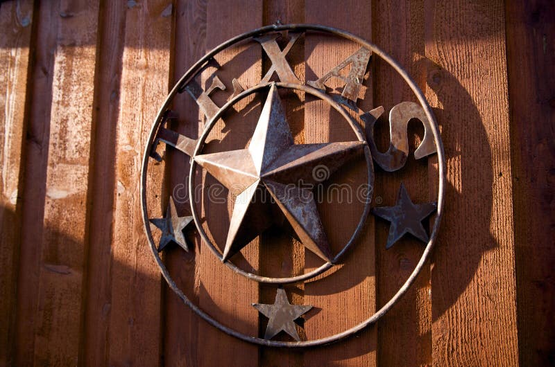 Un colgante rústico de la estrella de Tejas fotografía de archivo Un colgante rústico de la estrella de Tejas fotografía de archivo
