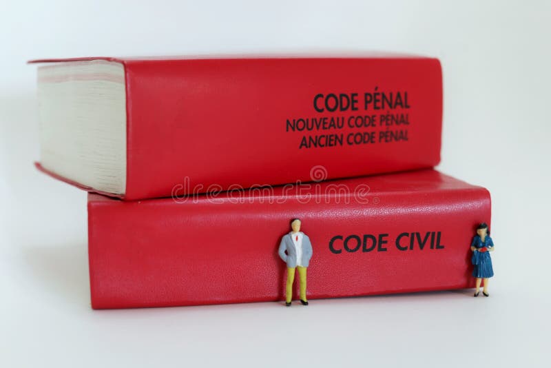 Two French law books and a separated couple made with miniatures. Two French law books and a separated couple made with miniatures