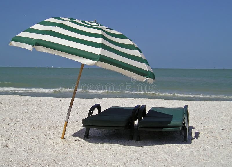 Nice sunny spot to spend a spring day on Marco Island, Florida. Can't you just smell the suntan lotion and hear the sounds of the beach...!. Nice sunny spot to spend a spring day on Marco Island, Florida. Can't you just smell the suntan lotion and hear the sounds of the beach...!