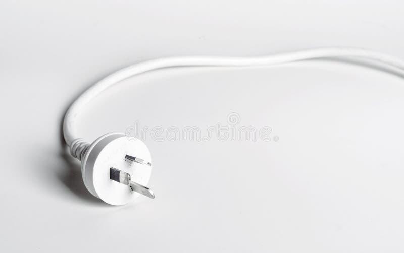 Un enchufe australiano blanco del cable eléctrico foto de archivo libre de regalías Un enchufe australiano blanco del cable eléctrico foto de archivo libre de regalías