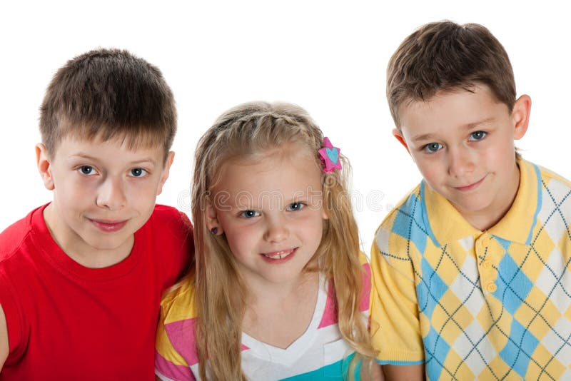 Un gruppo di tre bambini immagine stock libera da diritti Un gruppo di tre bambini immagine stock libera da diritti