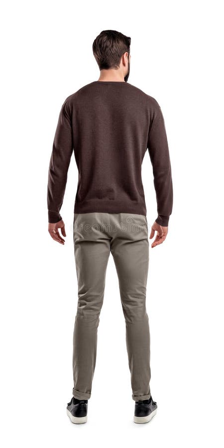 Un homme adulte dans les supports occasionnels de chandail dans une vue arrière avec les bras décontractés et sa tête légèrement photos stock Un homme adulte dans les supports occasionnels de chandail dans une vue arrière avec les bras décontractés et sa tête légèrement photos stock