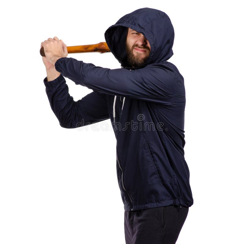 Un homme avec une batte photographie stock Un homme avec une batte photographie stock