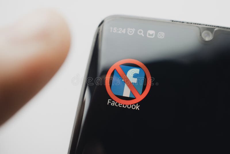 A crossed-out icon on a black smartphone screen. the concept of banning the application facebook. April 1, 2022. Barnaul. Russia. A crossed-out icon on a black smartphone screen. the concept of banning the application facebook. April 1, 2022. Barnaul. Russia