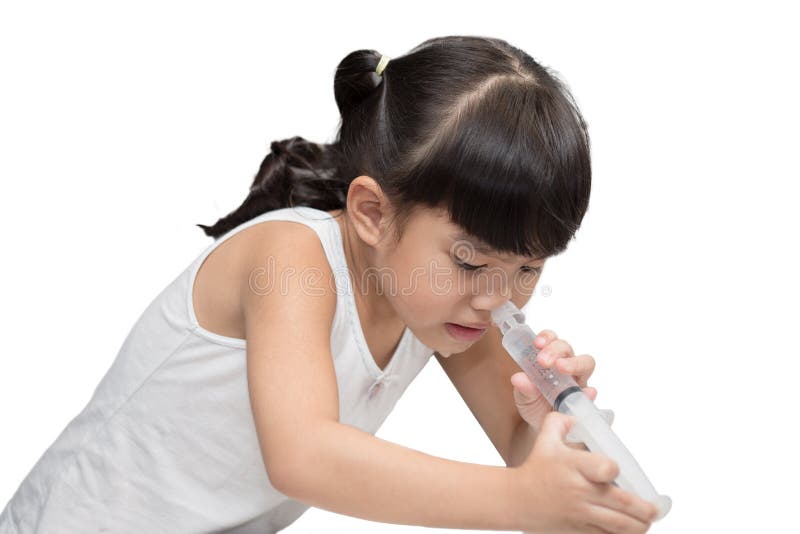 A sick children Saline nasal wash on white background. A sick children Saline nasal wash on white background