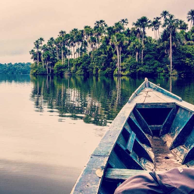 A peaceful moment in a boat at Lake Sandoval, South America, Peru, Peruvian Amazon. Madre de Dios. A peaceful moment in a boat at Lake Sandoval, South America, Peru, Peruvian Amazon. Madre de Dios.
