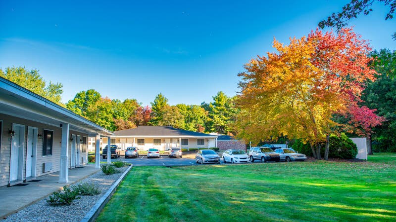 A motel in the forest, autumn foliage season. A motel in the forest, autumn foliage season