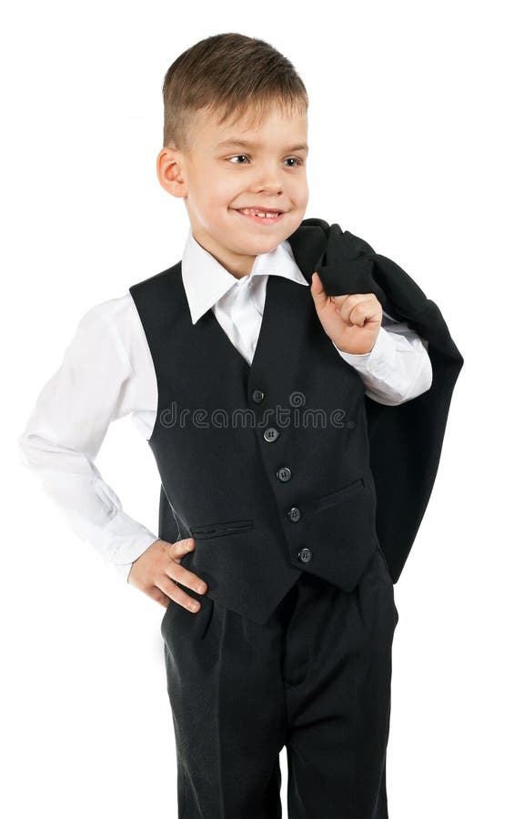 Un Niño Pequeño Lindo En Una Camisa Blanca Y Un Chaleco Negro Es Holdin  Imagen de archivo - Imagen de aislado, vertical: 107898275