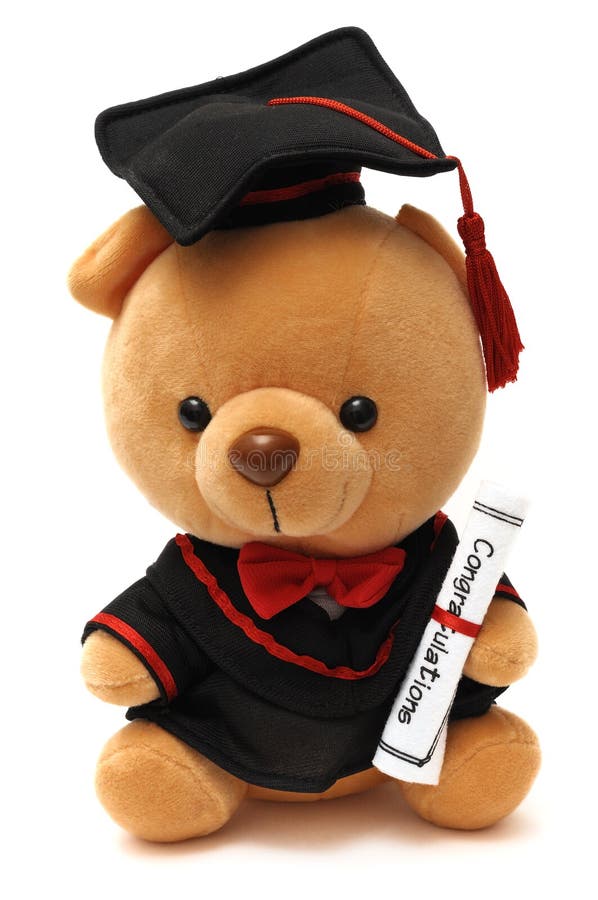 Un oso de peluche suave del juguete que lleva un vestido de la graduación fotografía de archivo libre de regalías Un oso de peluche suave del juguete que lleva un vestido de la graduación fotografía de archivo libre de regalías