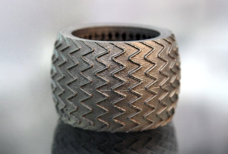 A metal prototype obtained by laser sintering in the metal 3D printer DMLS, image with shallow depth of field. A metal prototype obtained by laser sintering in the metal 3D printer DMLS, image with shallow depth of field