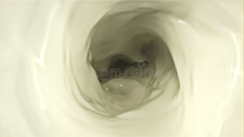 Un remolino de leche. vista superior. grabado en una cámara de alta velocidad a 1. 000 fps. metrajes