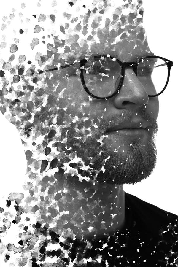 Un retrato de un hombre combinado con salpicaduras de tinta negra. pintoresca. fotografía de archivo