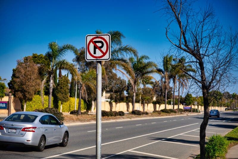 Oxnard, United States - February 20 2020 : a road sign along the road is indicating that no parking is allowed. Oxnard, United States - February 20 2020 : a road sign along the road is indicating that no parking is allowed