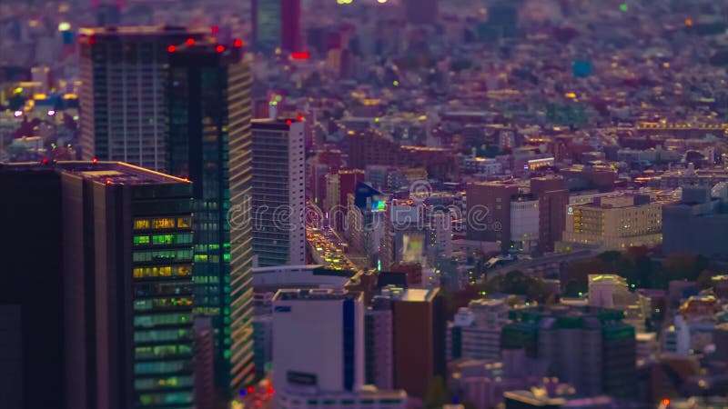 Un temps de temporarisation du paysage urbain urbain miniature dans l'inclinaison courbe de changement d'inclinaison de Tokyo