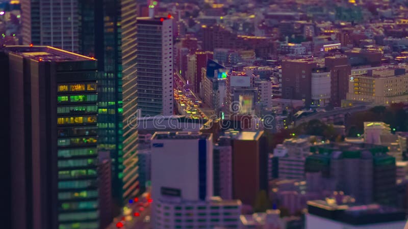 Un temps de temporarisation du paysage urbain urbain miniature en cuisine courbe de changement d'inclinaison de Tokyo