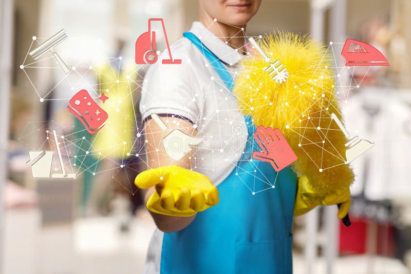 Un travailleur tient une structure de nettoyage de service photo libre de droits Un travailleur tient une structure de nettoyage de service photo libre de droits