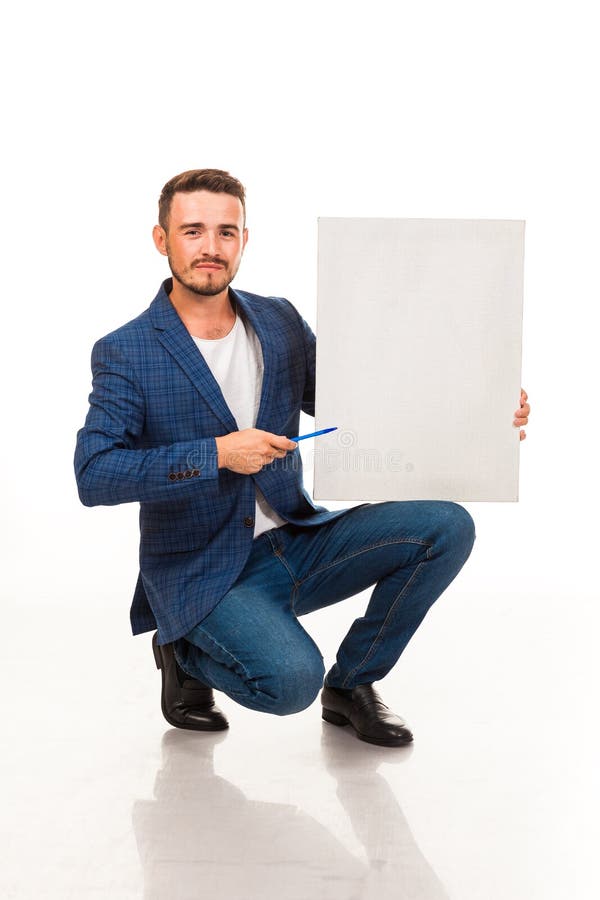 Un type avec une barbe posant avec un signe blanc Peuvent être employés pour faire de la publicité, des cartes de visite professi image libre de droits Un type avec une barbe posant avec un signe blanc Peuvent être employés pour faire de la publicité, des cartes de visite professi image libre de droits
