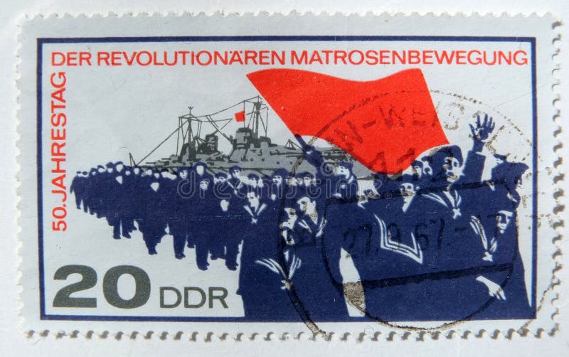 Un viejo sello germanooriental que celebra la rebelión naval alemana de 1917 fotografía de archivo Un viejo sello germanooriental que celebra la rebelión naval alemana de 1917 fotografía de archivo