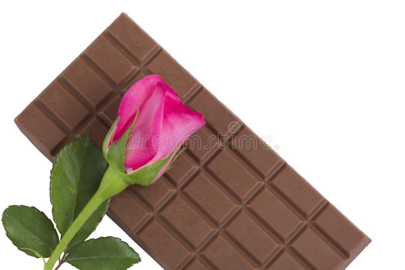 Una Barra De Chocolate Con Una Flor Color De Rosa Rosada Foto de archivo -  Imagen de fragilidad, bloque: 37680182
