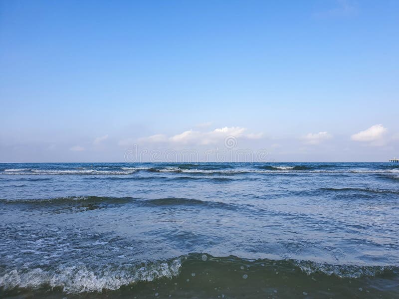 A warm summer morning on the coast of the Black sea. Anapa, Krasnodar region. Calm sea, sunrise. A warm summer morning on the coast of the Black sea. Anapa, Krasnodar region. Calm sea, sunrise