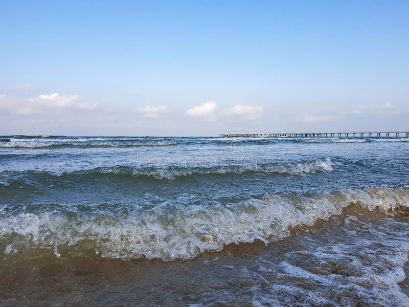 A warm summer morning on the coast of the Black sea. Anapa, Krasnodar region. Calm sea, sunrise. A warm summer morning on the coast of the Black sea. Anapa, Krasnodar region. Calm sea, sunrise