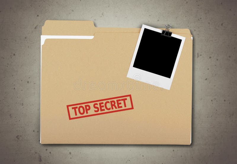 Una carpeta de Manila con las palabras descoloradas de alto secreto encendido fotografía de archivo libre de regalías Una carpeta de Manila con las palabras descoloradas de alto secreto encendido fotografía de archivo libre de regalías