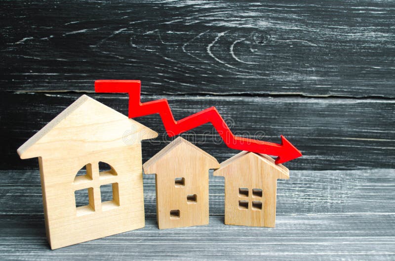 Una disminución en precios de la propiedad disminución de la población interés descendente en la hipoteca reducción en la demanda imagenes de archivo Una disminución en precios de la propiedad disminución de la población interés descendente en la hipoteca reducción en la demanda imagenes de archivo