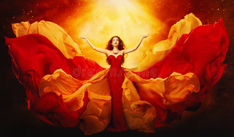 Una donna in abiti volanti ha alzato le braccia per la luce del mistero, una ragazza di Red Gown