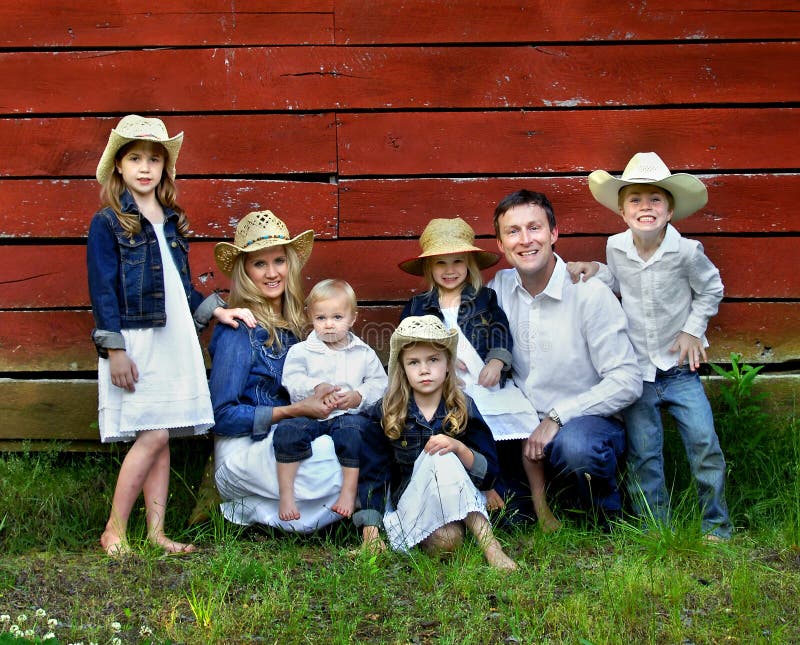 Una famiglia di sette fotografia stock Una famiglia di sette fotografia stock