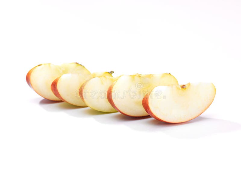 Una fila de la manzana cortada imágenes de archivo libres de regalías Una fila de la manzana cortada imágenes de archivo libres de regalías