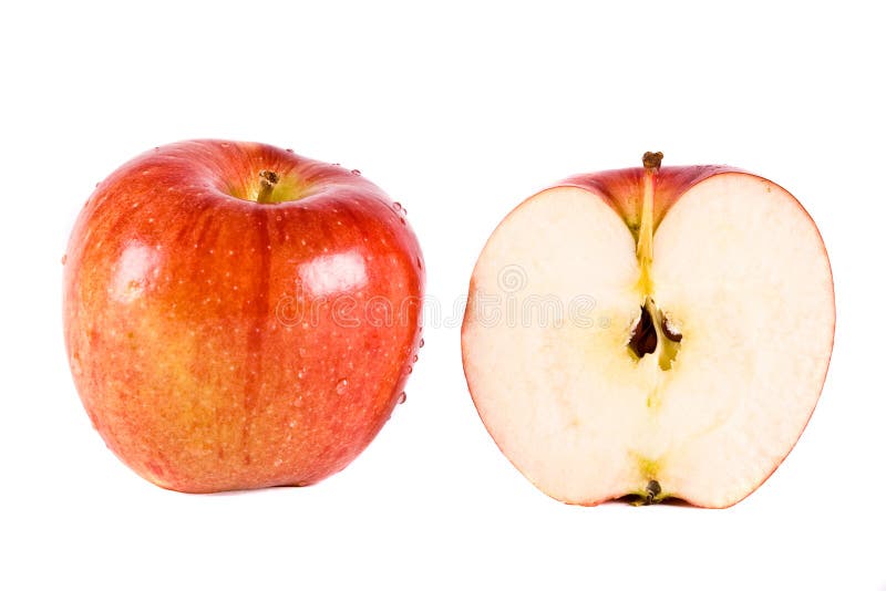 Una manzana roja y media fotos de archivo libres de regalías