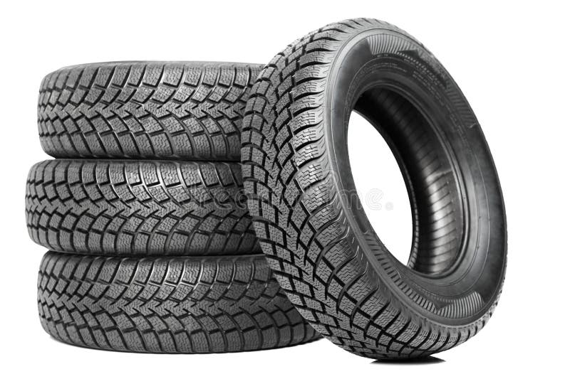 Una pila di quattro gomme di inverno della rotella di automobile isolate immagine stock Una pila di quattro gomme di inverno della rotella di automobile isolate immagine stock