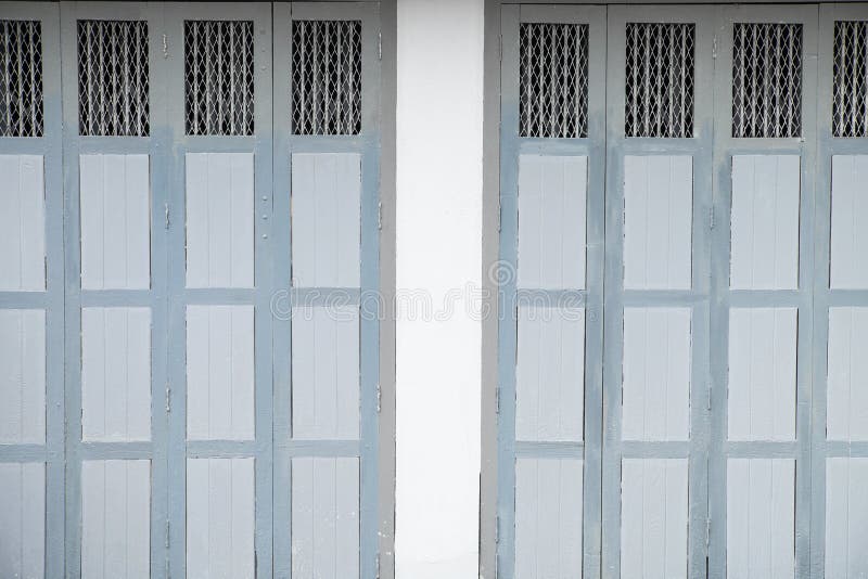 Una puerta del azul del vintage fotografía de archivo Una puerta del azul del vintage fotografía de archivo