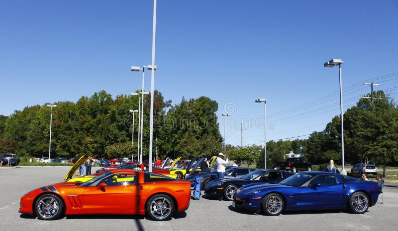 GLOUCESTER, VA- OCTOBER 13:A line of Corvettes at the Ken Houtz Chevrolet Buick, Camaro VS Corvette Humane Society car show and food drive in Gloucester, Virginia on October 13, 2012. GLOUCESTER, VA- OCTOBER 13:A line of Corvettes at the Ken Houtz Chevrolet Buick, Camaro VS Corvette Humane Society car show and food drive in Gloucester, Virginia on October 13, 2012
