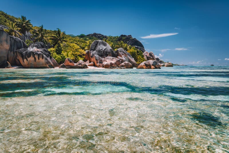 Anse Source d&#x27;Argent - exotic paradise beach with granite boulders on island La Digue at Seychelles. Anse Source d&#x27;Argent - exotic paradise beach with granite boulders on island La Digue at Seychelles.