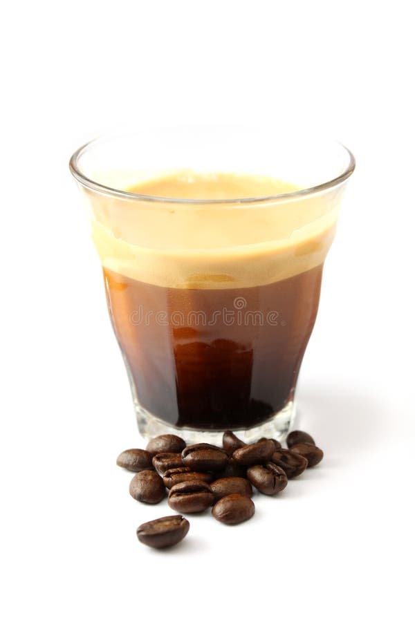 A nice cup of espresso with a couple of coffee beans. A nice cup of espresso with a couple of coffee beans