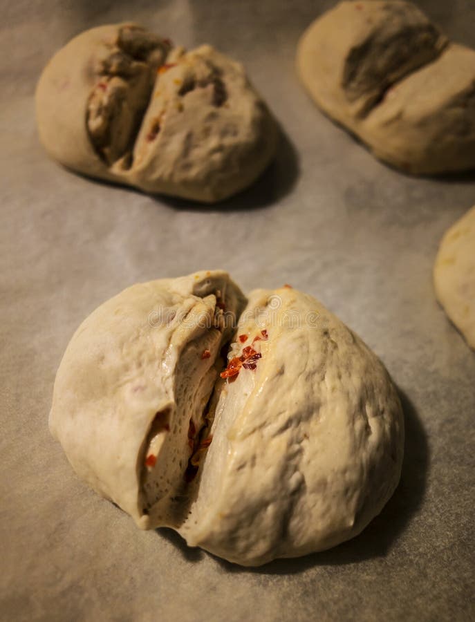 Unbaked Bread Dough on the Table. Sourdough Bread Buns Ready To Be