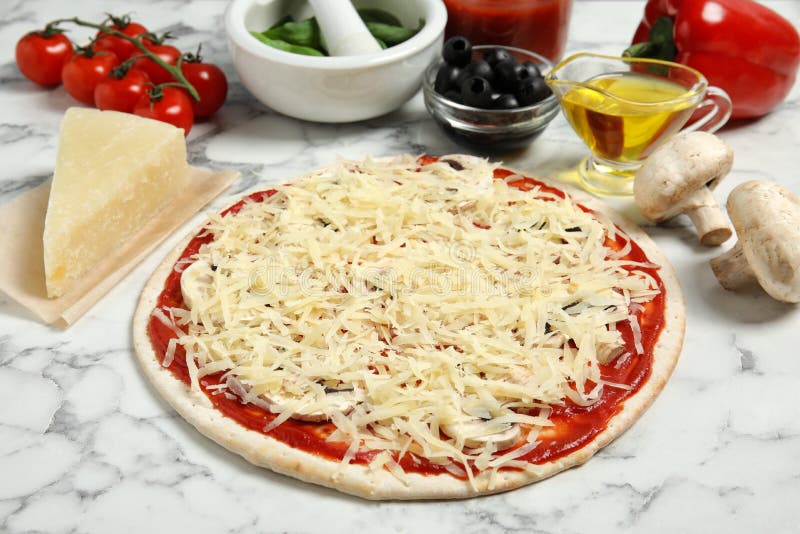 Unbaked Pizza and Ingredients on Table Stock Photo Image of bakery