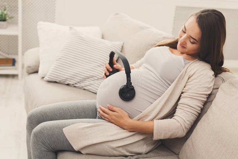 Music for Baby in Womb. Expecting Woman with Headphones Stock Image - Image  of pregnancy, parents: 169778021