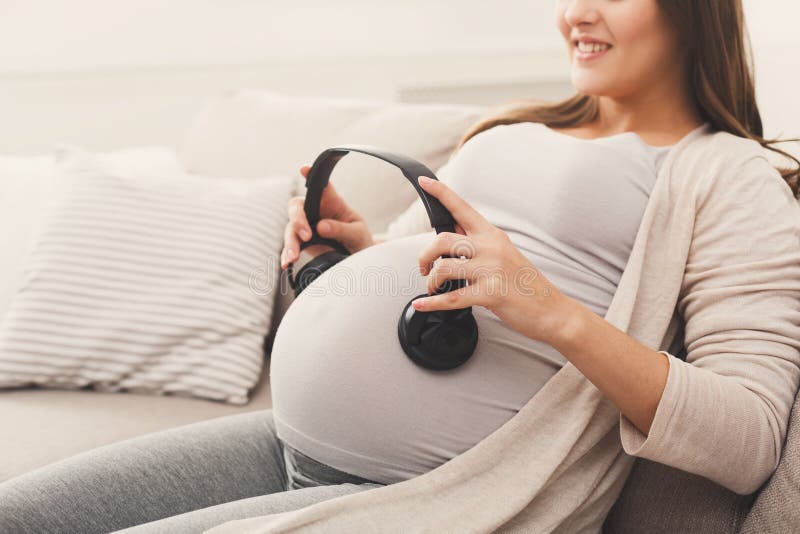 Unborn Baby Listening Music in Mother`s Belly Stock Photo - Image of hand,  expecting: 113581184