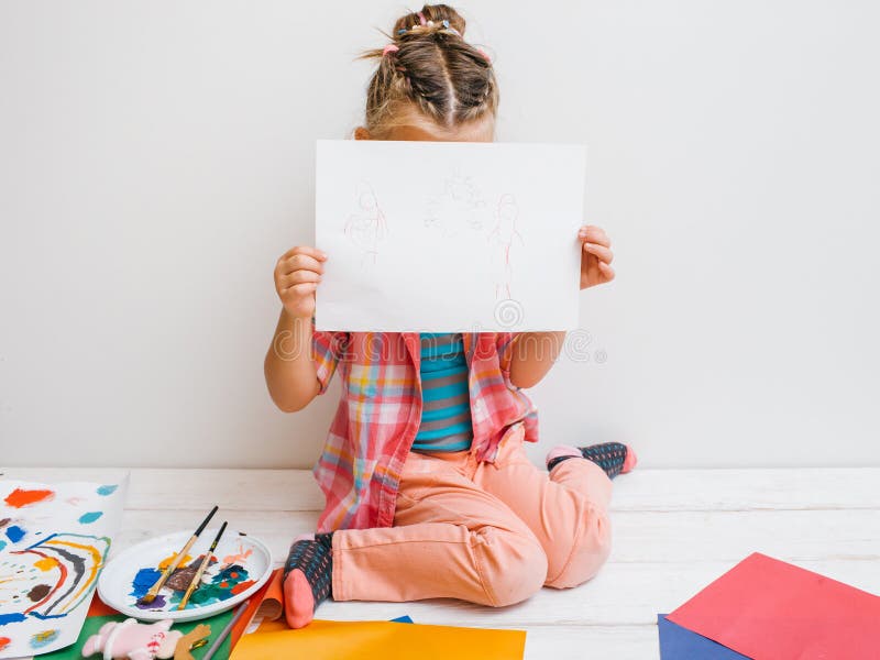 Uncertain artist. Shy baby girl stock images Uncertain artist. Shy baby girl stock images