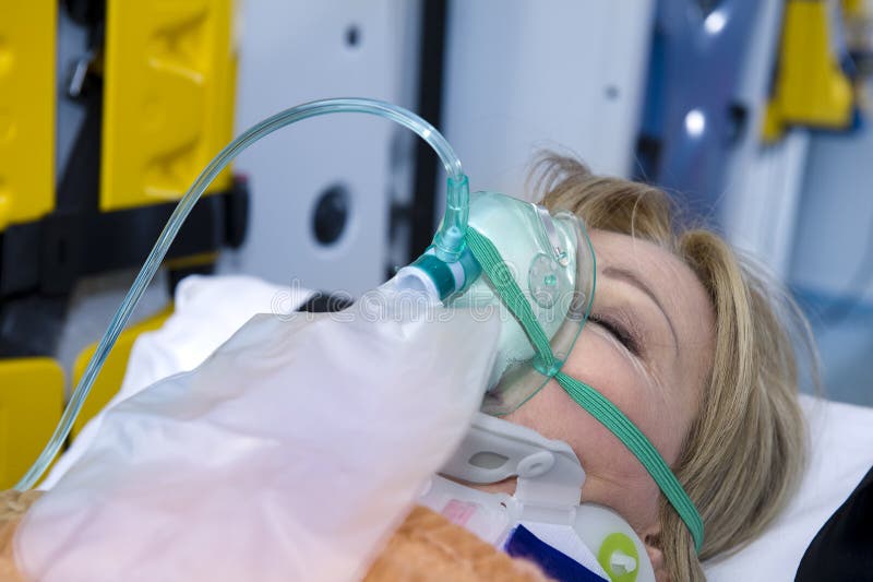 Unconscious Woman With Oxygen Mask