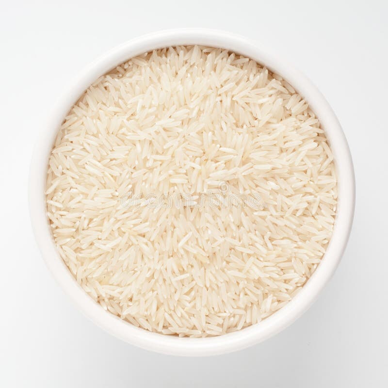 Uncooked basmati rice in a ceramic bowl