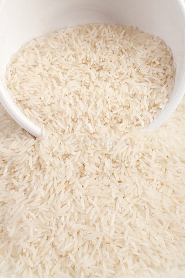 Uncooked basmati rice in a ceramic bowl